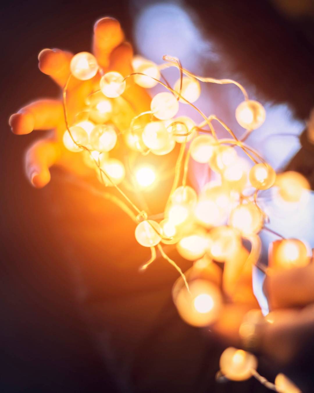 girl-holding-bright-shining-garlands-in-her-han-2025-01-08-23-13-47-utc